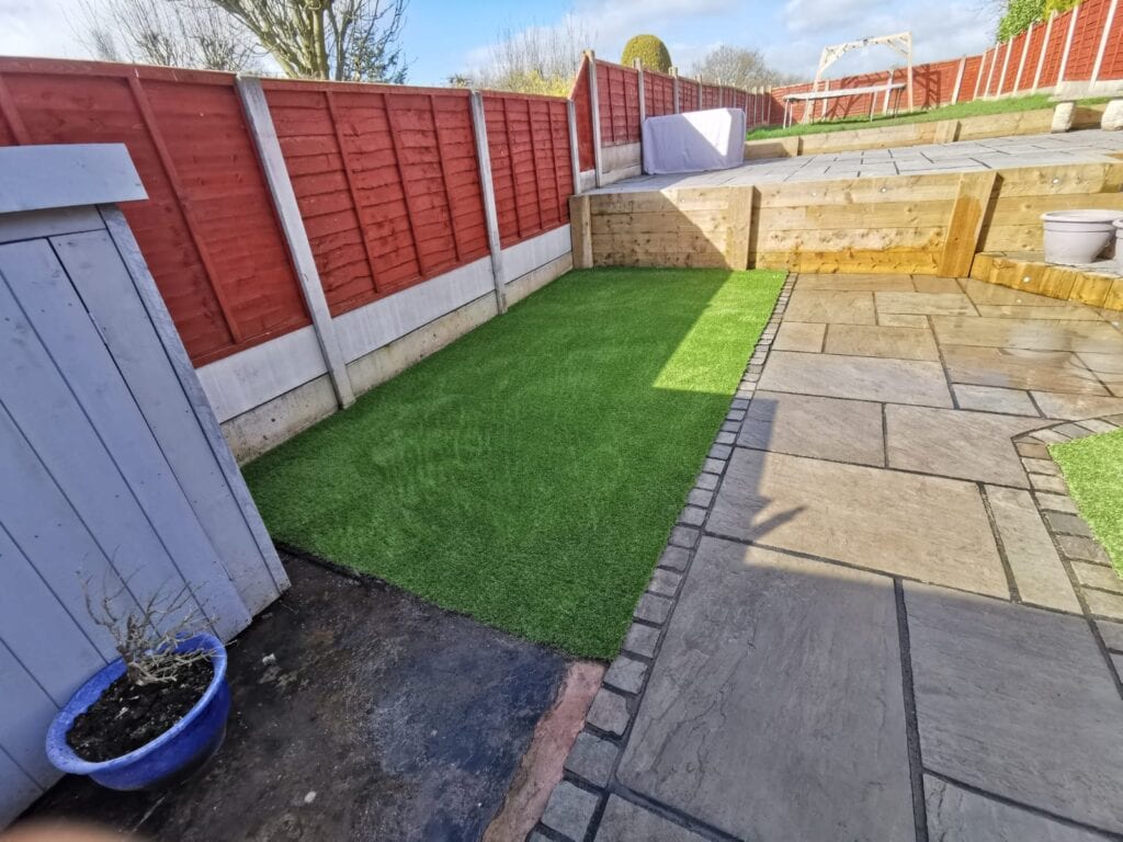 Small area covered in artificial grass.