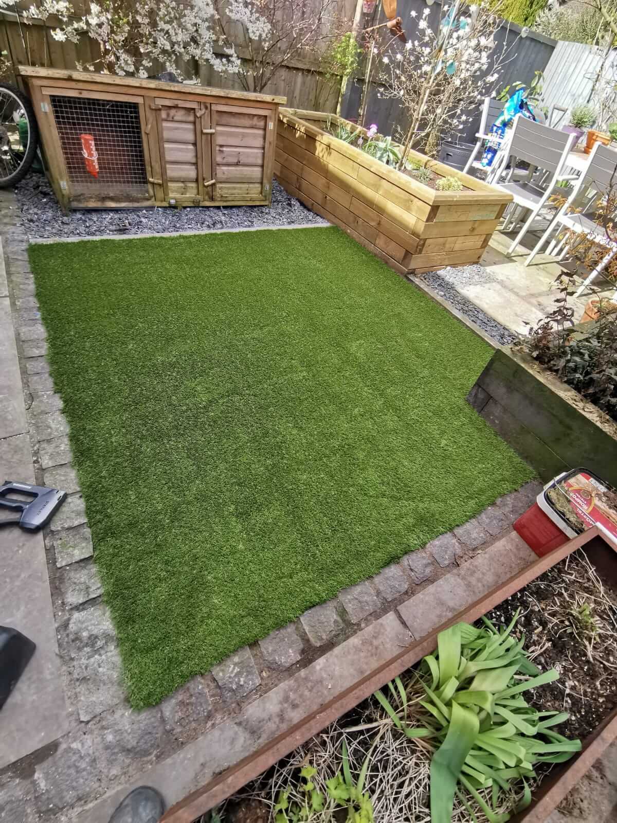 Back garden with artificial grass installed