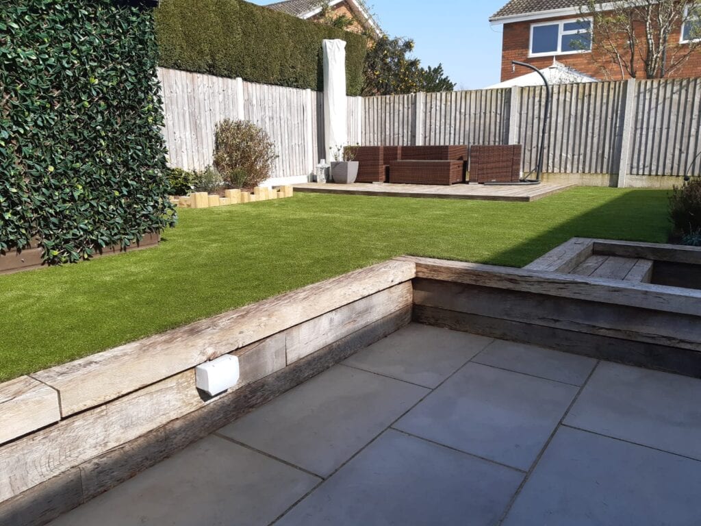 Artificial grass installed and part of the patio in frame too