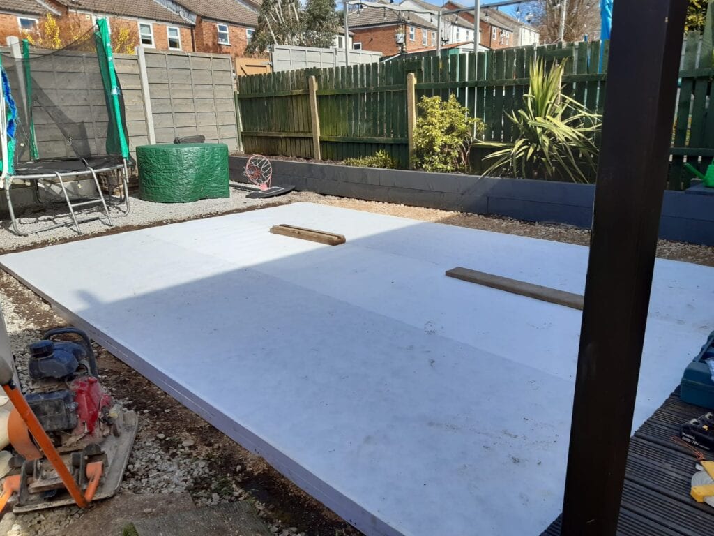 Weedproof membrane down on this artificial grass install