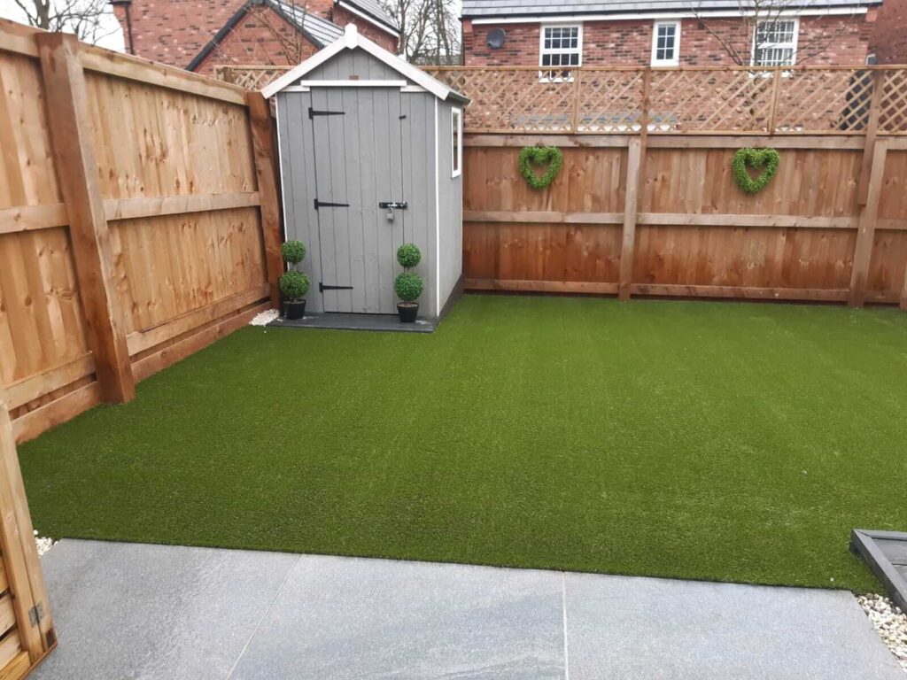 Image of the garden finished and complete with Delamere artificial grass. 