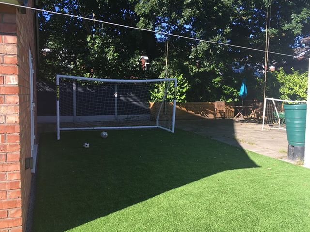 Photo of an artificial grassed football garden.